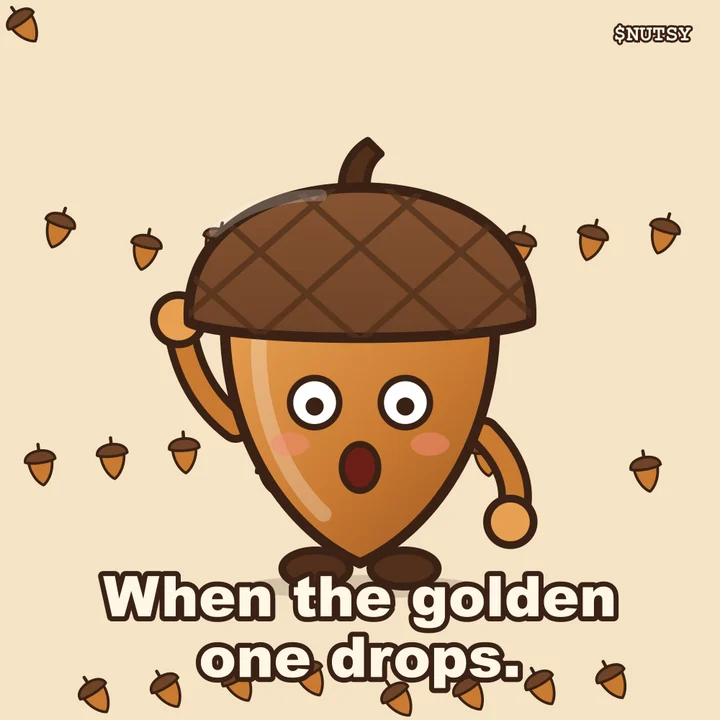 Nutsy amazed in a shower of acorns with the caption: When the golden one drops.