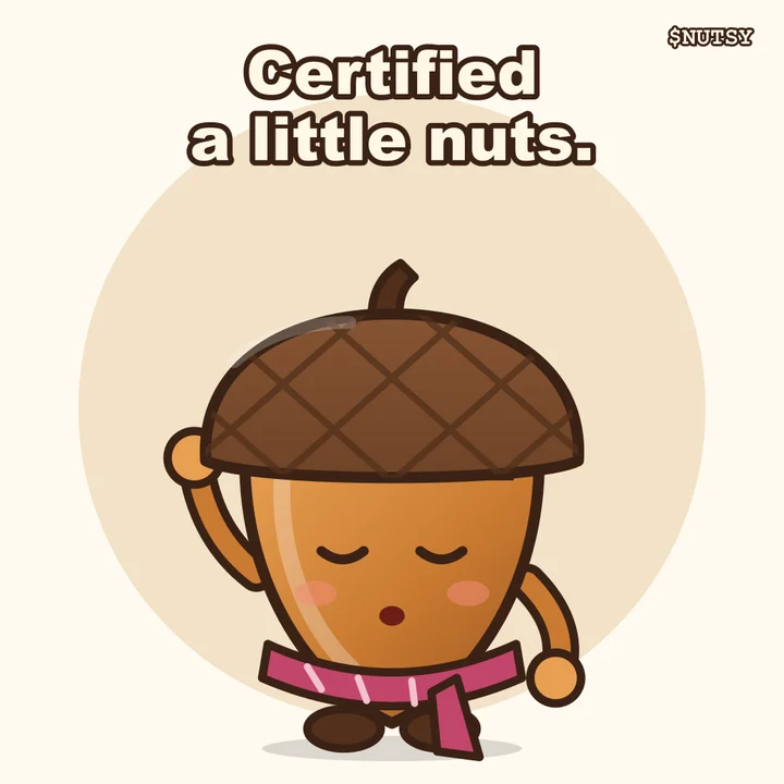 Nutsy dozing in a scarf with the caption: Certified a little nuts.